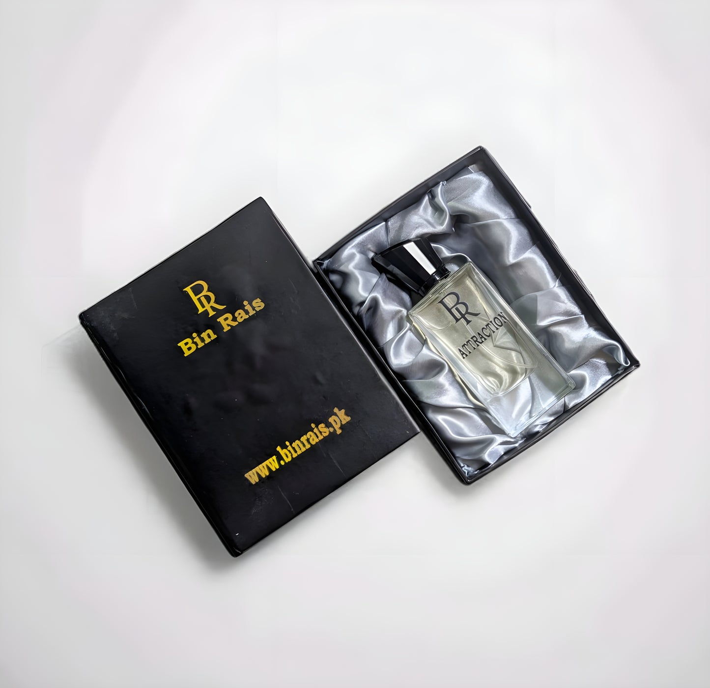"Elegant packaging of 'Attraction' perfume, evoking confidence and charisma with Aventus-inspired notes."