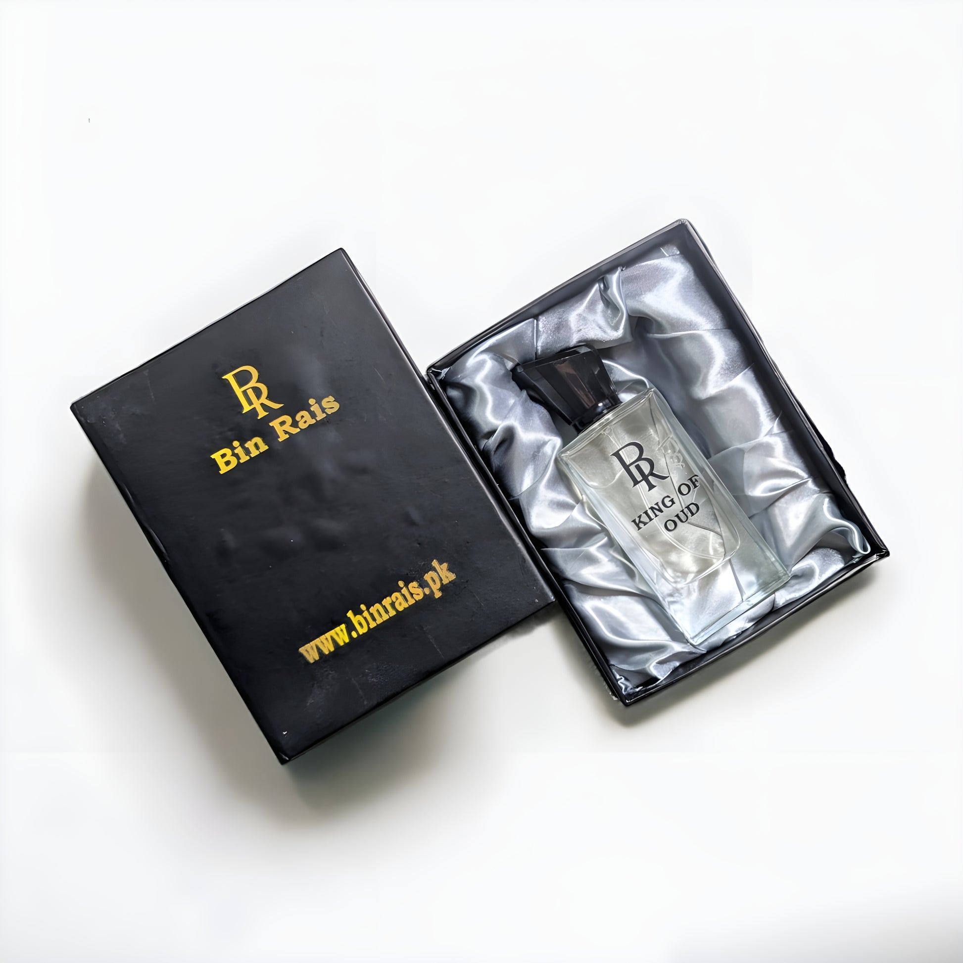 A signature King of Oud perfume blend with smooth white oud, photographed on a dark background for a powerful, majestic feel.